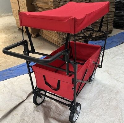 Los carros plegables del carro plegable rojo del carro con las ruedas cubren la manija del empuje